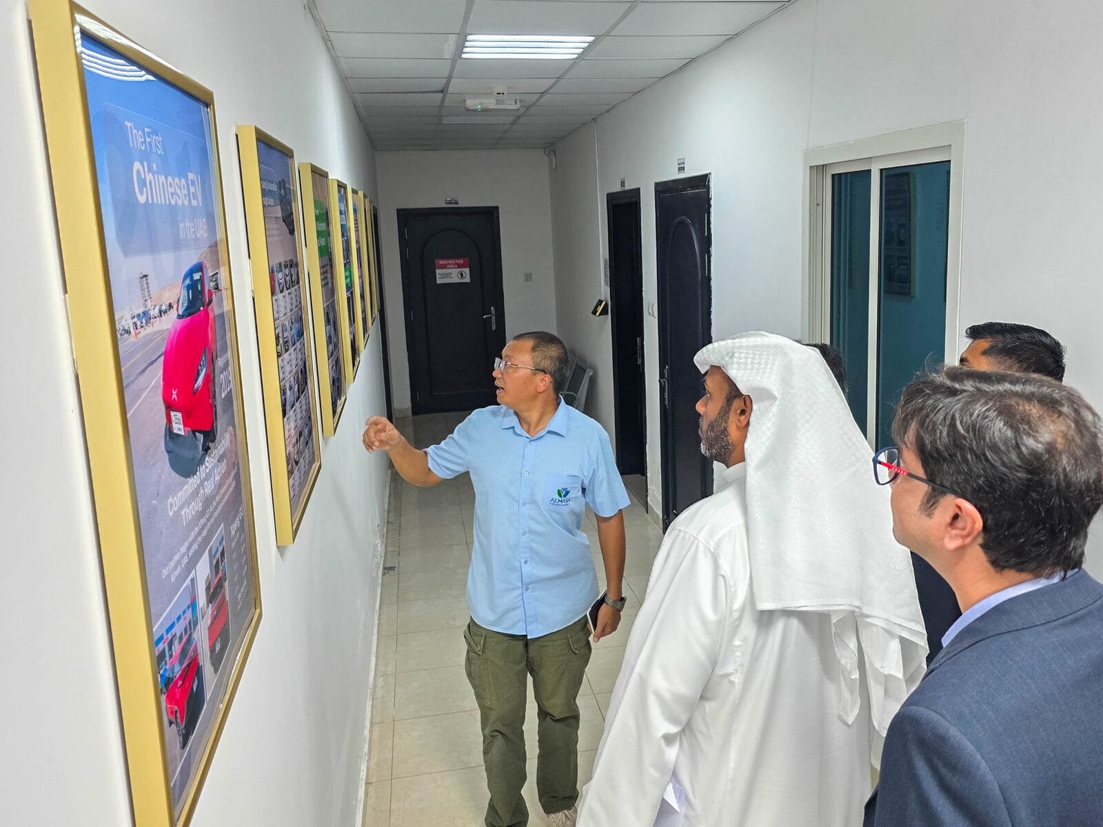 Almasa team showing the company history gallery to the Department of Energy Abu Dhabi delegation